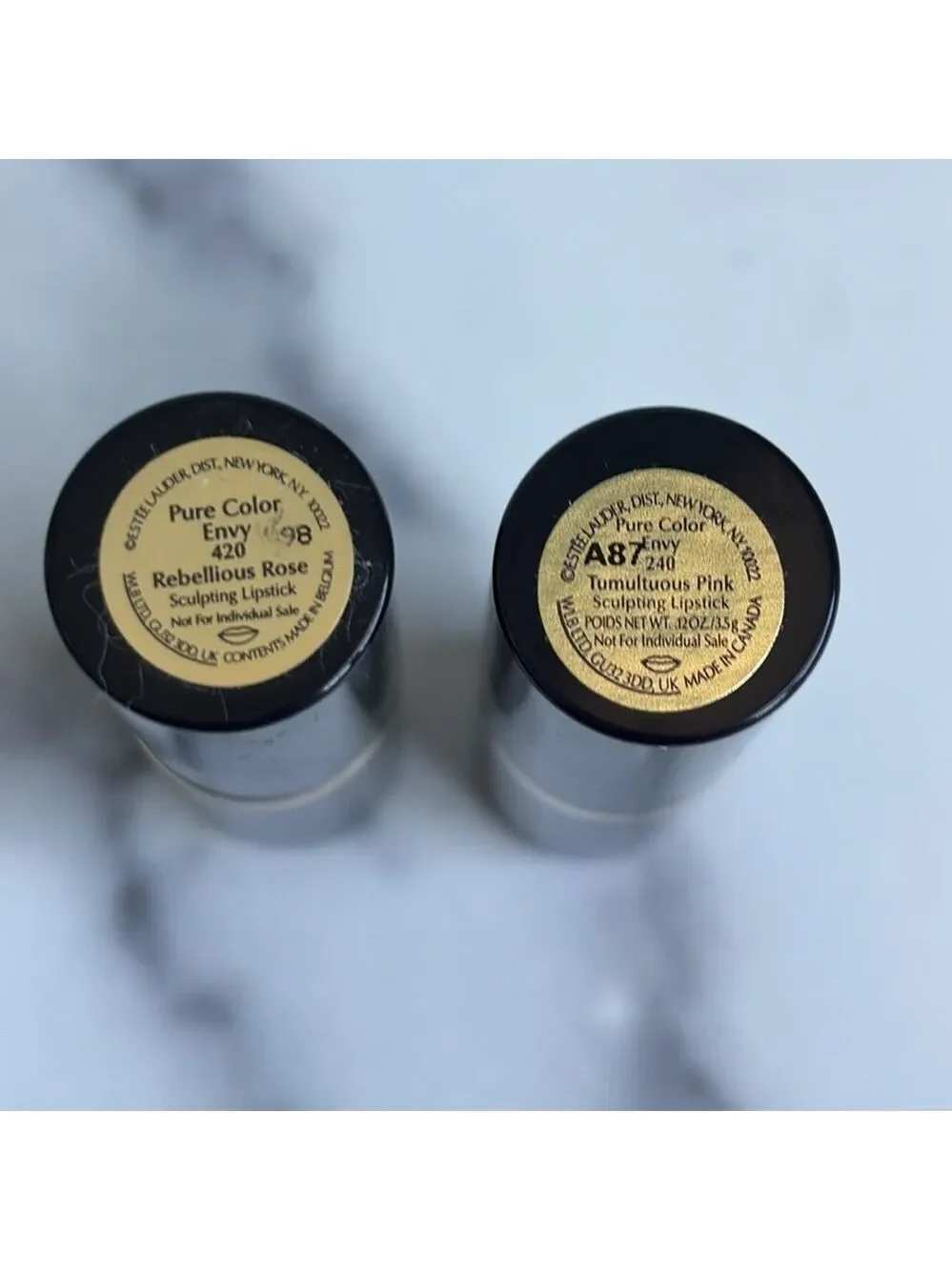 Set of Two Este Lauder Pure Color Lipsticks Rebellious Rose and Tumultuous Pink